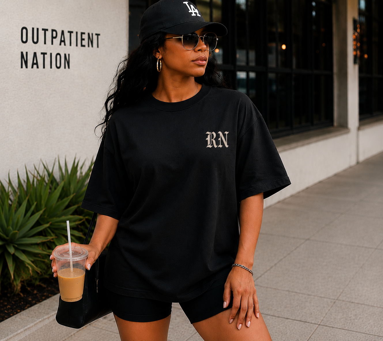 Black RN Nurse Gang t-shirt worn outside outpatient clinic in Los Angeles